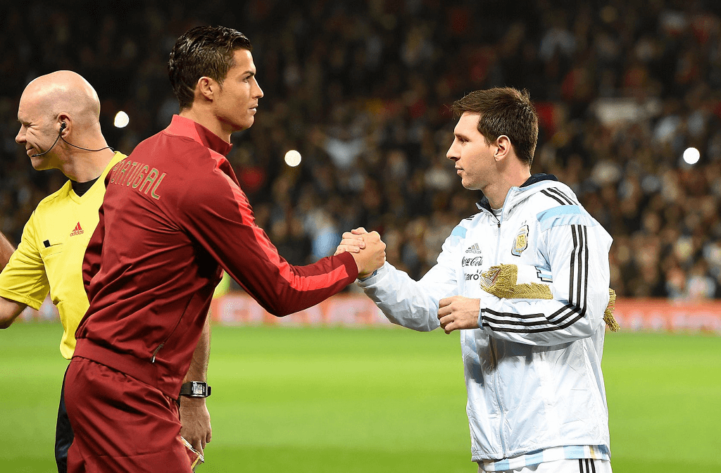 ortugal's Cristiano Ronaldo and Argentina's Lionel Messi shake hands