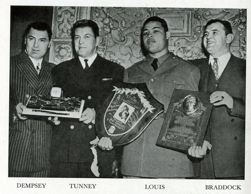 Four world boxing champions with their Boxing Belts Jack Dempsey, Gene, Tunney, Joe Louis, James J Braddock