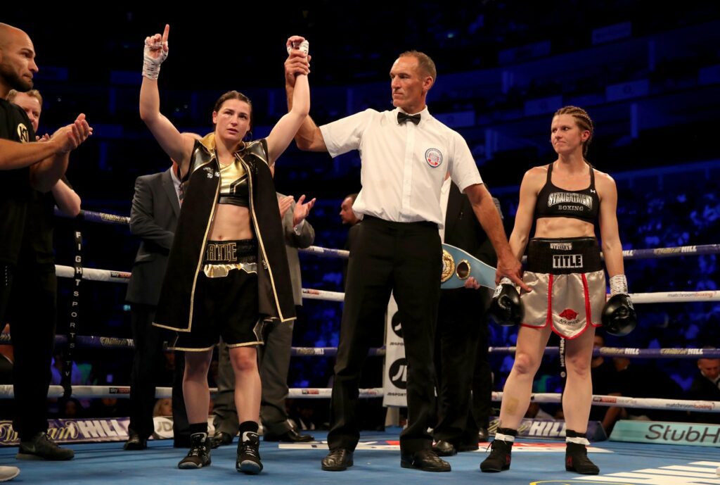 Katie Taylor celebrates beating Kimberly Connor during their IBF and WBA World Female Lightweight Title